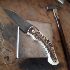 Unique friction folder with lock for Paul